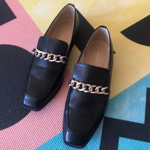 Nine West flats with chain embellishment